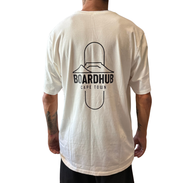 Person wearing a white t-shirt with 'BOARDHUB Cape Town' logo on the back.