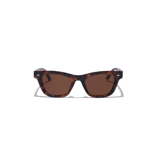 Sunglasses with tortoiseshell frame and brown lenses on a white background