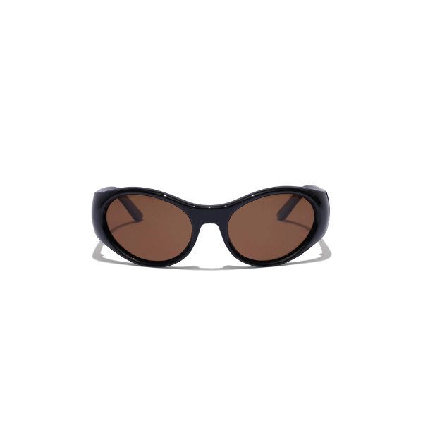 Black sunglasses with brown lenses on a white background